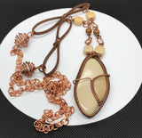 Tumbled River Rock wrapped in copper necklace, with mixed stones, leather and copper accents and chain