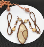 Tumbled River Rock wrapped in copper necklace, with mixed stones, leather and copper accents and chain