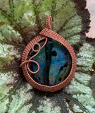 Colorful Dichroic Glass Cabochon created by Monkeylion Designs, wrapped in Copper and sealed to prevent tarnishing.