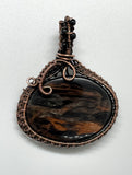 Mahogany Gold Sheen Obsidian Pendant in Wire Wrapped Copper with Faceted Black Spinel Beads on the Bail.
