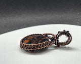 Mahogany Gold Sheen Obsidian Pendant in Wire Wrapped Copper with Faceted Black Spinel Beads on the Bail.