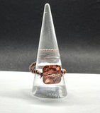 Adjustable Copper Wire Wrapped Ring with a brilliant peach colored Swarovski Crystal.