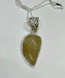 Golden Rutilated Quartz in Sterling Silver with 20" Sterling Silver Chain. 