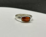Sterling Silver Ring with Flashy Faceted Orange Kyanite. 