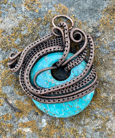 Turquoise Blue Howlite (dyed) Donut Pendant with layers of Copper Weaves and Coils.  