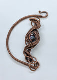 Handwoven Copper Weaves surround a beautiful Peacock Pearl in this handmade bracelet.