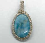 wire wrapped larimar pendant in silver