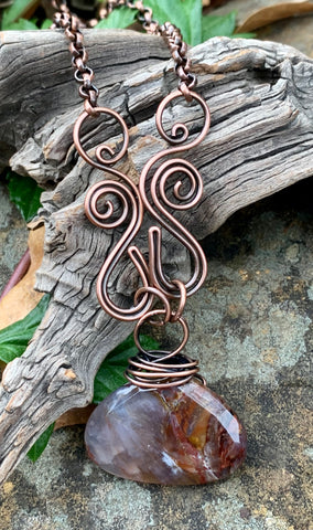 Hand formed Copper Swirls and a Beautiful Faceted Pietersite Stone in this stunning handmade necklace. 