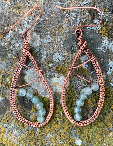 Delicate, lightweight hand woven copper earrings with Aquamarine added for extra shine.