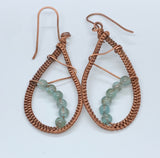 Delicate, lightweight hand woven copper earrings with Aquamarine added for extra shine.