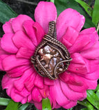 Lustrous Wire Wrapped Melted Copper Pendant.