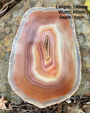 Beautiful Natural Striped Polished Brazilian Agate Slice with Druzy on one side. A beautiful display piece.