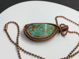 Burtis Blue Turquoise Pendant wrapped in Copper