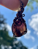 Unique Purple Agate Pendant in Square Copper Wire. 