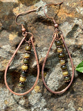 Hammered Copper Hoop Earrings with Green Cats Eye Dangles.