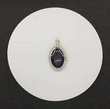 Glittering Blue Goldstone Pendant wrapped in Sterling Silver