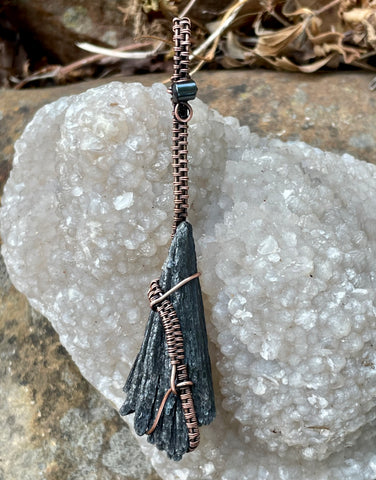 Wire Wrapped Copper Broom Pendant with Raw Black Kyanite and Hematite.