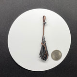 Wire Wrapped Copper Broom Pendant with Raw Black Kyanite and Hematite.