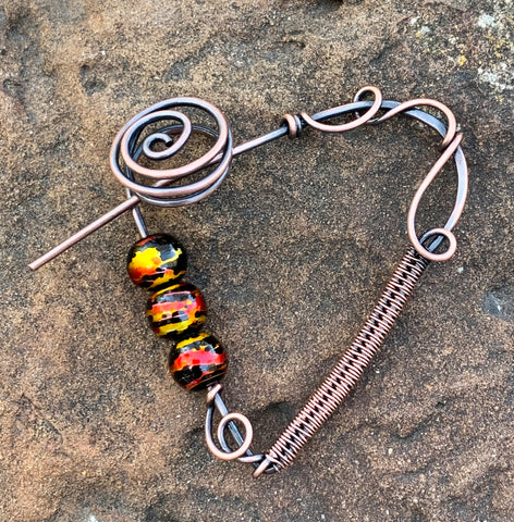 Hand formed Copper Heart Pin with wire wrapped copper, copper swirls, and colorful metal beads for a pop of color.