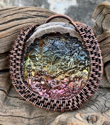 Beautiful colored Bismuth Pendant in wire wrapped copper.