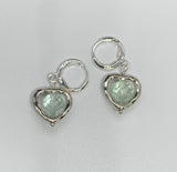 Sparkling Sterling Silver Earrings with Faceted Fluorite nestled inside Silver Plated Hearts.