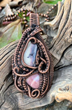 Hand woven Copper surrounds two Porcelain Jasper stones creating a unique, one of a kind pendant.