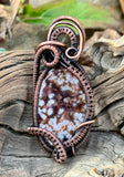 Delightful Orbs and Druzy Pockets in this Orbicular Jasper Pendant in layers of wire wrapped Copper.