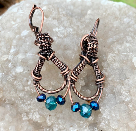 Elegant Wire wrapped Copper Earrings with Blue Crystals and Copper leverback ear wires.