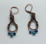 Elegant Wire wrapped Copper Earrings with Blue Crystals and Copper leverback ear wires.