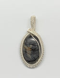 Richly Veined and Colored Picasso Jasper Pendant in wire wrapped Sterling (.925) and Fine (.999) Silver.