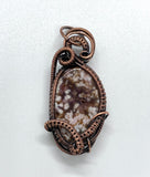 Delightful Orbs and Druzy Pockets in this Orbicular Jasper Pendant in layers of wire wrapped Copper.