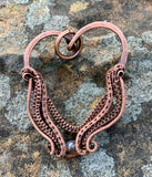 Hammered Copper Heart Pendant with layers of wire wrapped copper weaves and a labradorite bead accent.