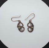 Delicate hand woven copper earrings with Czech glass beads and handmade copper ear wires.