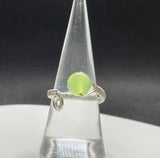 Adjustable Apple Green Prehnite Ring in Wire Wrapped Argentium Silver. 