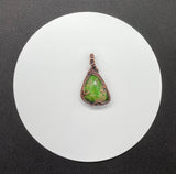 Bright Green Parrot Wing Chrysocolla Pendant in Wire Wrapped Copper. 