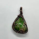 Bright Green Parrot Wing Chrysocolla Pendant in Wire Wrapped Copper. 