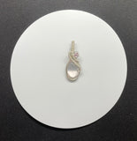 Faceted Rose Quartz Pendant in Wire Wrapped Argentium Silver