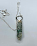 Sparkling Green Kyanite Pendant set in Sterling Silver, comes with an 20" sterling silver chain.