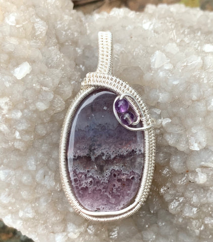 Dazzling Striated Amethyst Pendant wrapped in hand woven Sterling (.925) and Fine (.999) Silver with Amethyst Accent beads. 