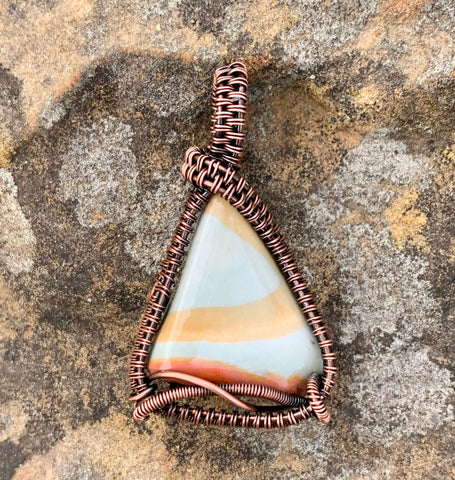Bright colorful tumbled Polychrome Jasper Pendant wrapped in Copper. 