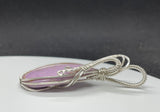 This elegant pendant features a captivating lilac Phosphosiderite gemstone, set in sleek sterling silver for a refined and timeless look. The soft lavender hues of the stone exude tranquility and sophistication, making it a perfect statement piece. Handcrafted with care, this pendant is ideal for those who appreciate unique gemstones and graceful, artisan jewelry.