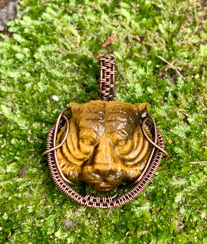 Carved Tiger Eye Tiger Pendant wrapped in Copper
