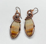 Banded Calcite Earrings in handwoven Copper with copper bead accent, these have niobium ear wires.