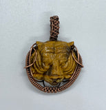 Carved Tiger Eye Tiger Pendant wrapped in Copper