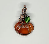 Lovely Orange Carnelian Pumpkin Pendant in Copper with Glass Leaf Accent. Perfect for Fall Celebrations! 
