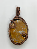 Lysite Agate Pendant wrapped in handwoven copper.  