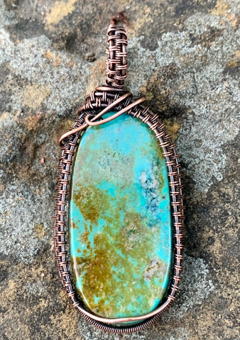 Beautiful Turquoise Pendant in hand woven Copper. 