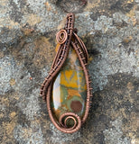 This colorful Bamboo Leaf Jasper Pendant is wrapped in handwoven Copper.