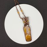 Stunning Plume Agate Necklace in wire wrapped Copper with yellow glass and gray agate bead accents. Comes on a 19 1/4" bead accent chain. 