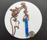Adjustable Copper Necklace with wire wrapped Blue Sea Sediment Jasper. 